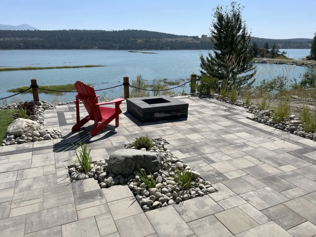 Belgard paver patio with fire pit overlooking Lake Koocanusa