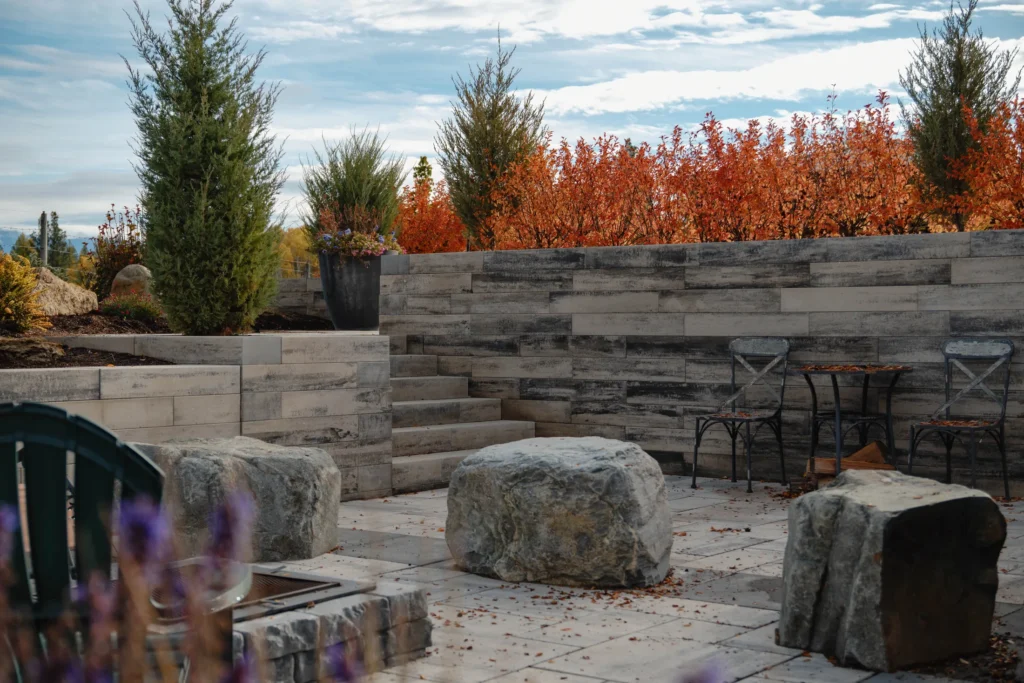 Natural rock seating integrated beside the fire pit