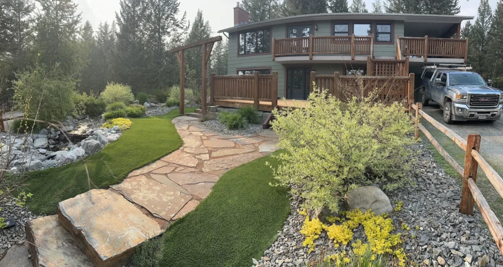 Slate walkway curving toward the cedar deck