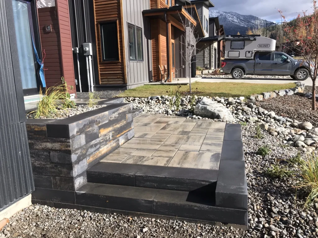 Flint Architextures entrance steps and retaining planters
